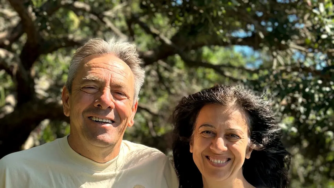 Giacomo and Antonella Lombardi among the olive trees
